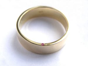 22ct Gold and Secret Ruby Wedding Band