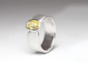 18ct Fairtrade white gold with yellow sapphire