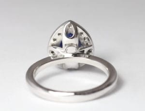18ct Fairtrade gold with pear sapphire and diamond halo by Zoe Pook Jewellery