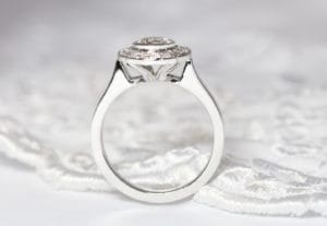 18ct Fairtrade white gold with diamond halo