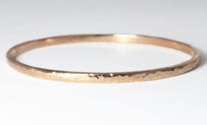 18ct Fairtrade rose gold hammered finish bangle by Zoe Pook Jewellery