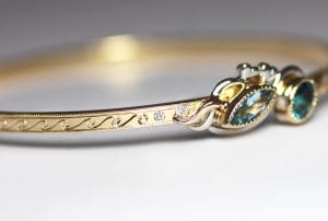 Bangle with aquamarine, tourmaline, diamonds, hand engraving
