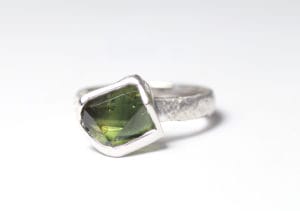 18ct Fairtrade gold with custom cut sapphire by Zoe Pook Jewellery