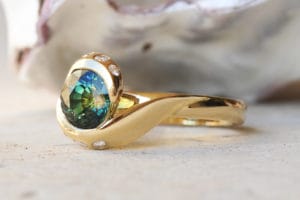 18ct Fairtrade yellow gold with parti sapphire