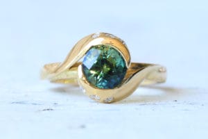 18ct Fairtrade yellow gold with parti sapphire