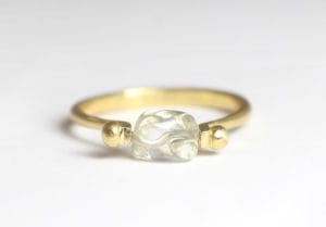 18ct Fairtrade gold with rough diamond on rotating pin setting by Zoe Pook Jewellery