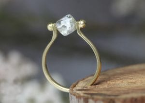 18ct Fairtrade gold with rough diamond on rotating pin setting by Zoe Pook Jewellery