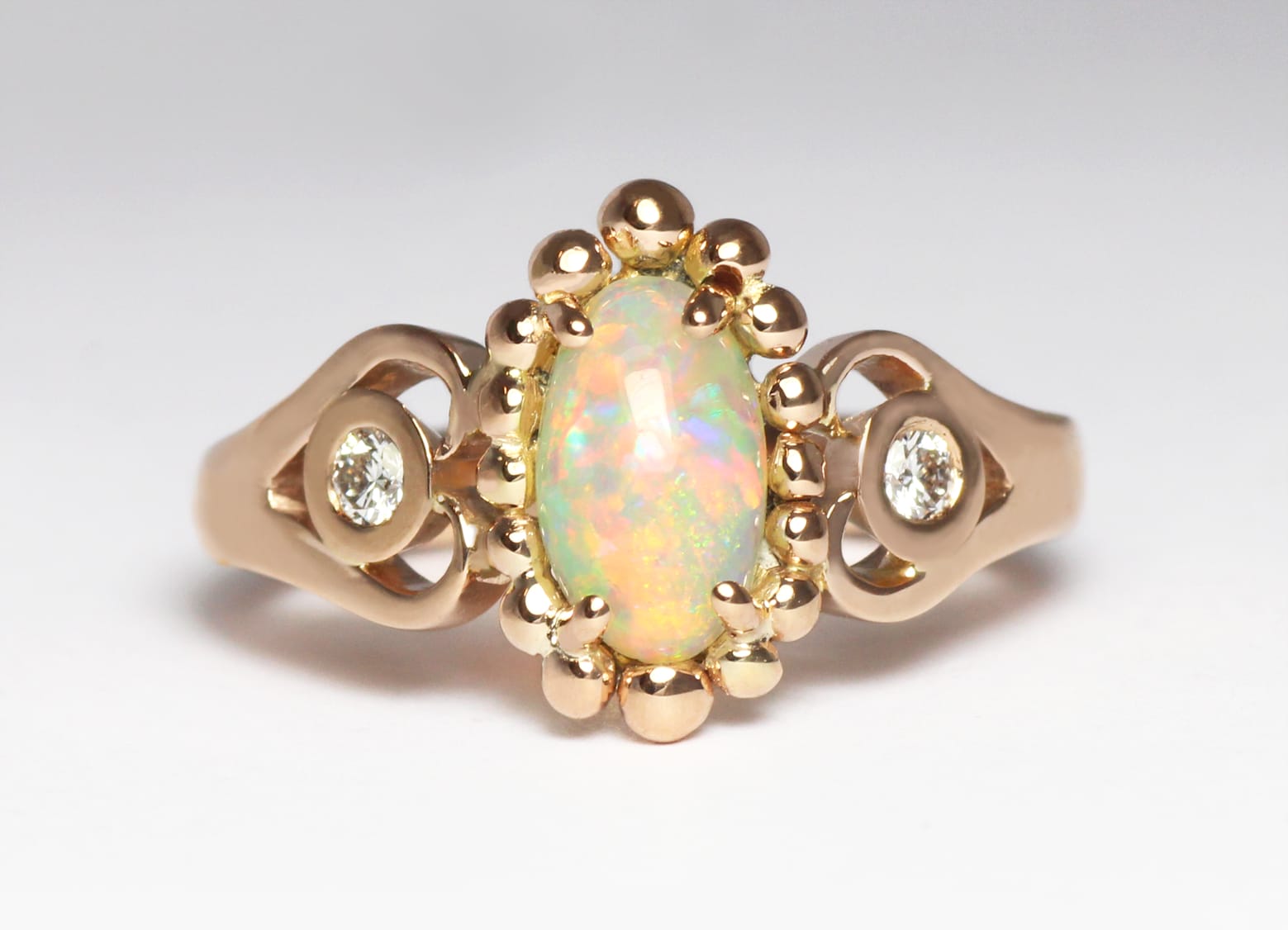 Opal in 18ct rose gold with diamonds,