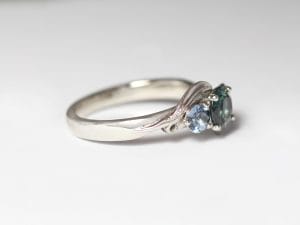 Platinum with sapphire and spinels by Zoe Pook Jewellery