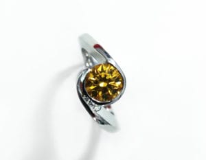 Recycled gold with sapphire and diamonds by Zoe Pook Jewellery