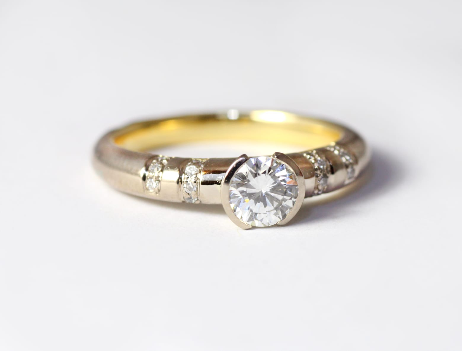 18ct Fairtrade gold with main diamond and small diamonds by Zoe Pook Jewellery
