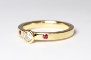18ct gold with diamond and rubies