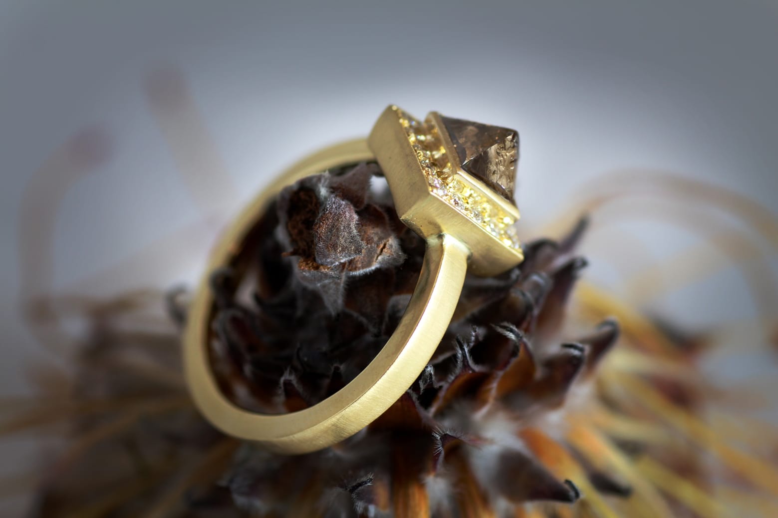 18ct Fairtrade gold with rough diamonds and diamond halo