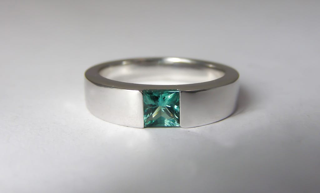 Recycled platinum and blue tourmaline engagement ring.