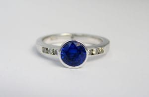 Ethical sapphire and diamond engagement ring