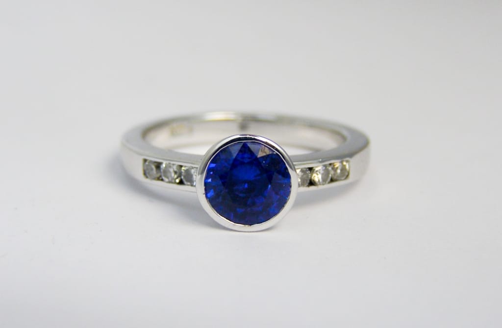 Ethical sapphire and diamond engagement ring