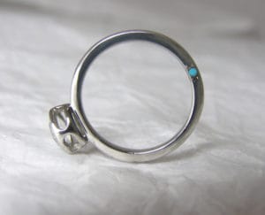 18ct Fairtrade gold with white sapphire