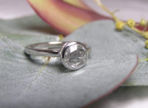 18ct Fairtrade gold with white sapphire