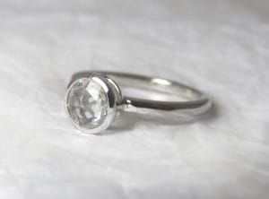 18ct Fairtrade gold with white sapphire