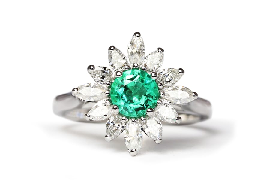 emerald and moissanite white gold ring