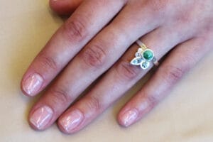 Jadeite, peridot, aqua, diamonds on hand