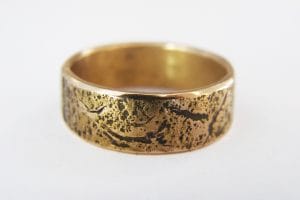 Textured yellow gold wedding ring