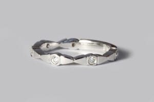 Shaped band with diamonds