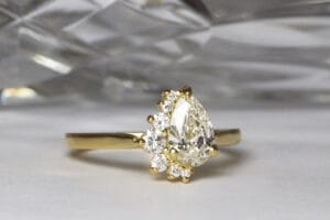 Pear diamond half halo
