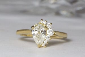 Pear diamond half halo