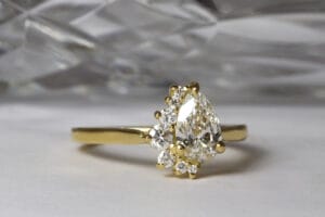 Pear diamond half halo