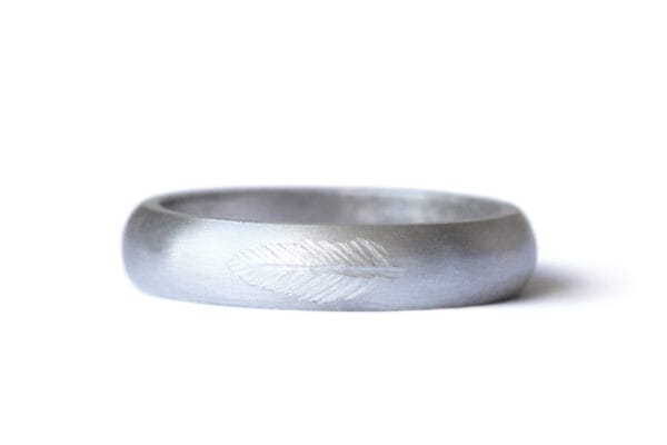 Feather engraved silver ring