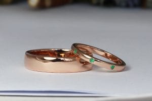 Rose gold wedders with emeralds