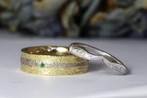 White and yellow gold wedding band set