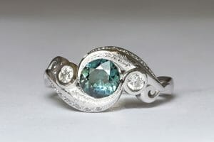 white gold sapphire leaf design