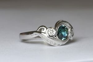 white gold sapphire leaf design