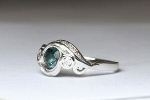 white gold sapphire leaf design