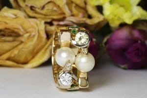 Emerald, pearl, diamonds yellow gold
