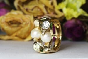 Emerald, pearl, diamonds yellow gold