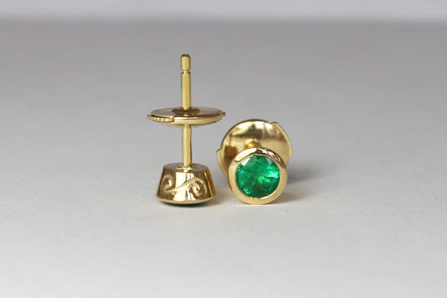 Emeralds in yellow gold