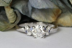 Lab diamond with sapphires