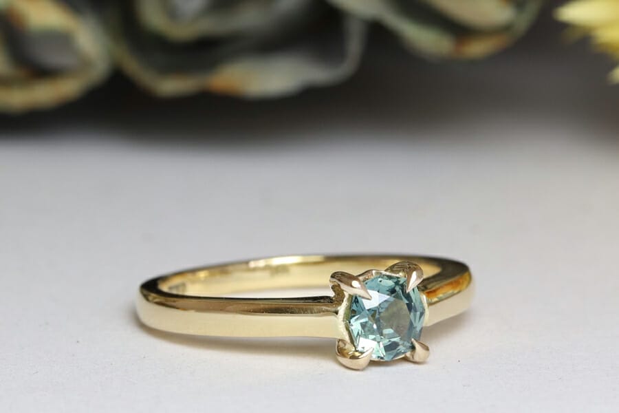 teal sapphire yellow gold