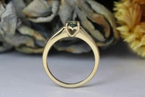 teal sapphire yellow gold
