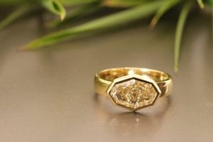 18ct yellow gold engagement ring with a champagne 2ct+ octagon diamond.