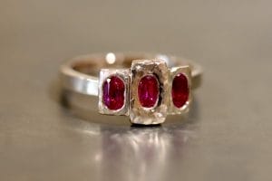 Yellow gold and ruby ring with organic texture.