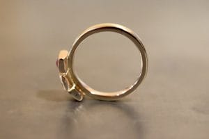 Yellow gold and ruby ring with organic texture.