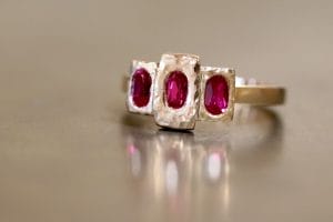 Yellow gold and ruby ring with organic texture.