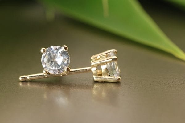 9ct Yellow gold studs with brilliant white sapphires.